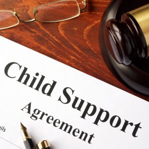 Child support agreement on an office table.